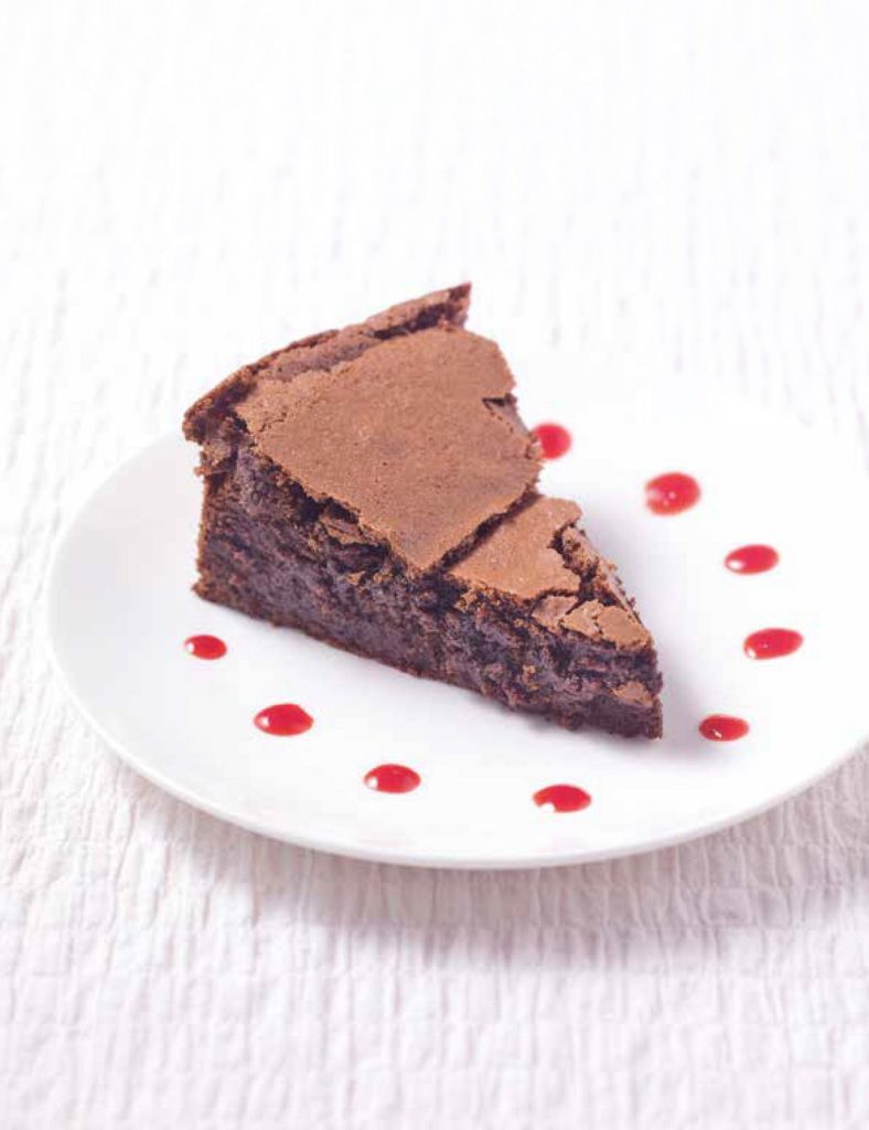 Chocolate Cake with Vanilla Whipped Cream and Raspberry Coulis
