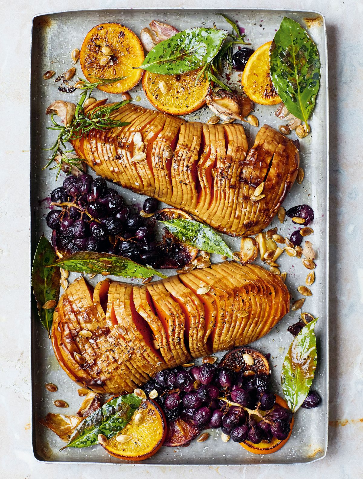 Melissa Hemsley’s Hasselback Squash with Roasted Grapes and a Sprout and Blue Cheese Slaw