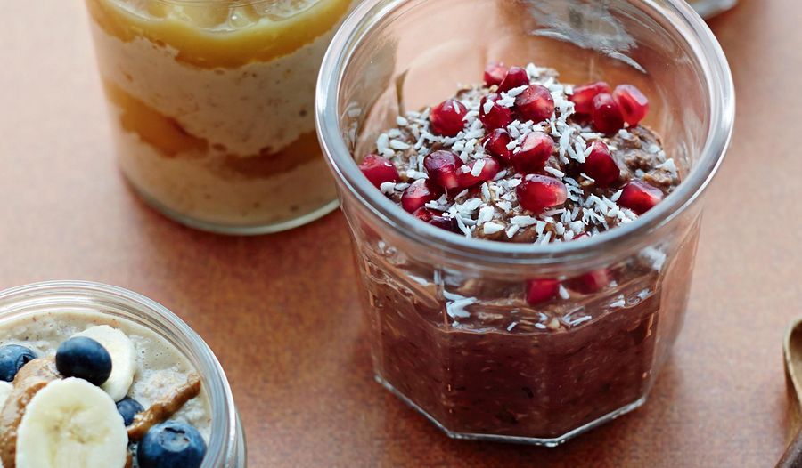 Chocolate Overnight Oats with Crushed Raspberries and Coconut