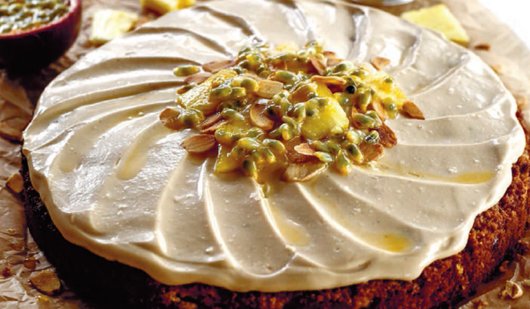 Gluten and dairy free Pineapple Carrot Cake with Passionfruit Coconut Frosting