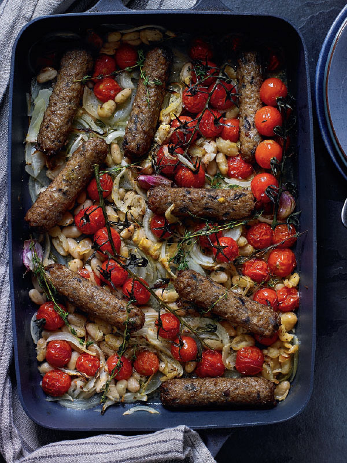 Braised Sausage All-in-one with Cherry Tomatoes, Cannellini Beans and Cider