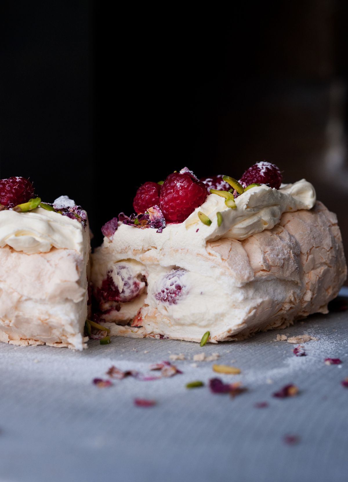 Meringue Roulade with Rose Petals and Fresh Raspberries