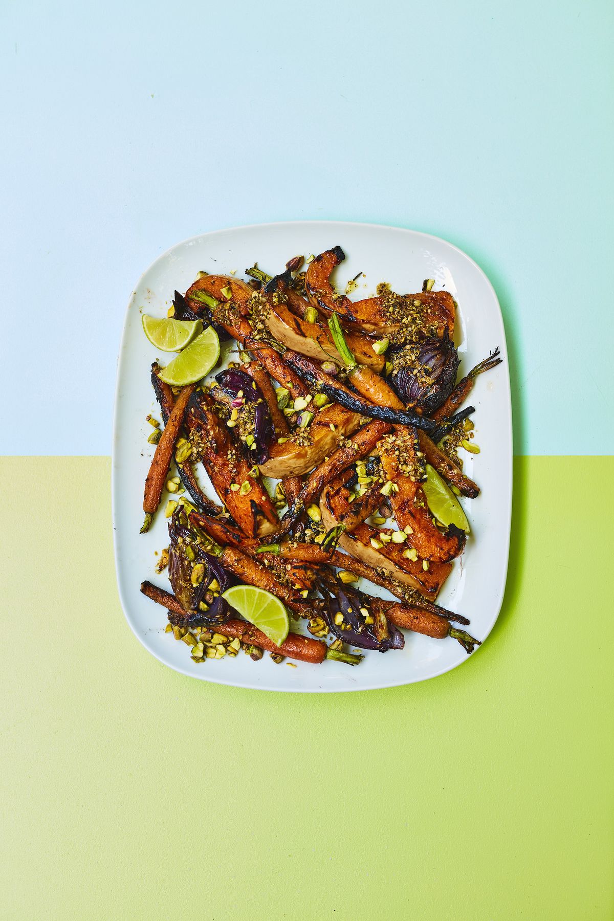 Squash with Charred Carrots, Red Onions, Coriander Seeds, Pistachios and Lime
