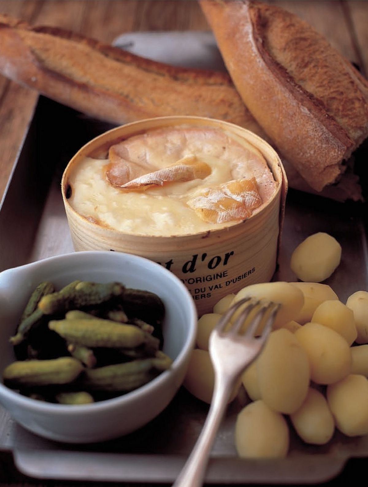 Baked Whole Vacherin Mont d’Or (with New Potatoes and Gherkins)