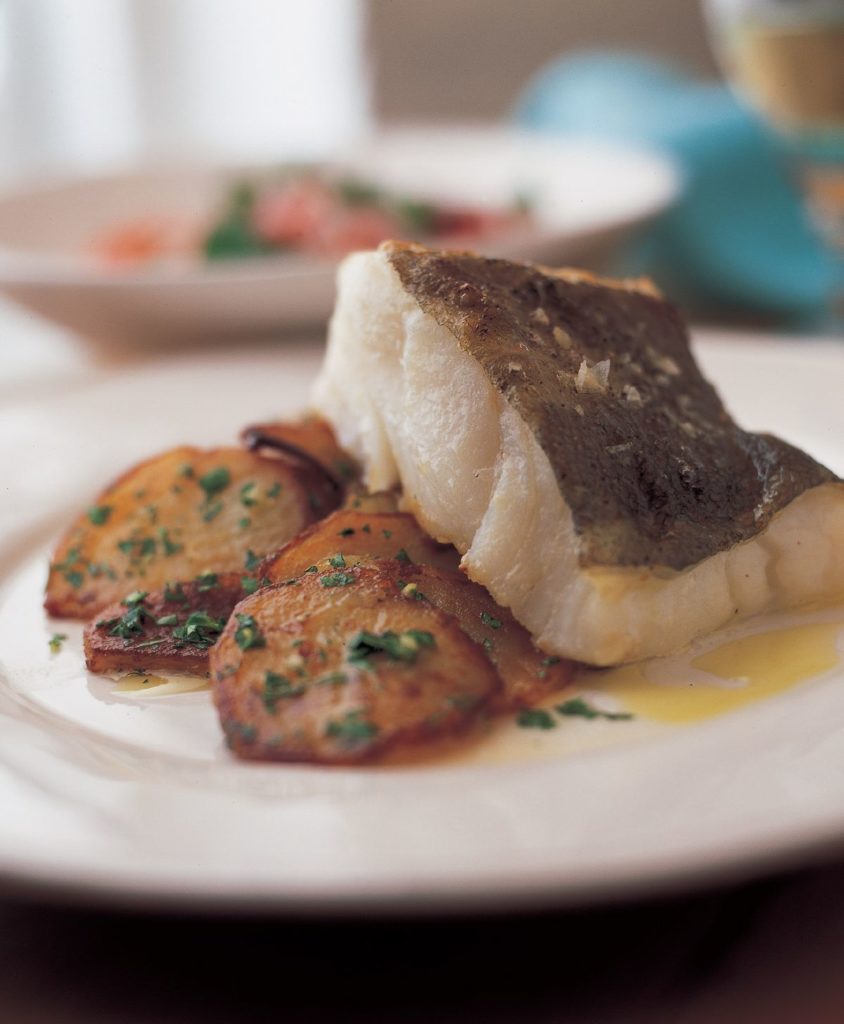 Grilled Cod on Pommes Sarladaise with Truffle Oil