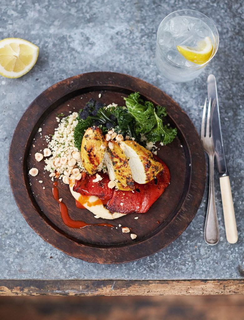 Seared Turmeric Chicken Houmous, Peppers, Couscous and Greens