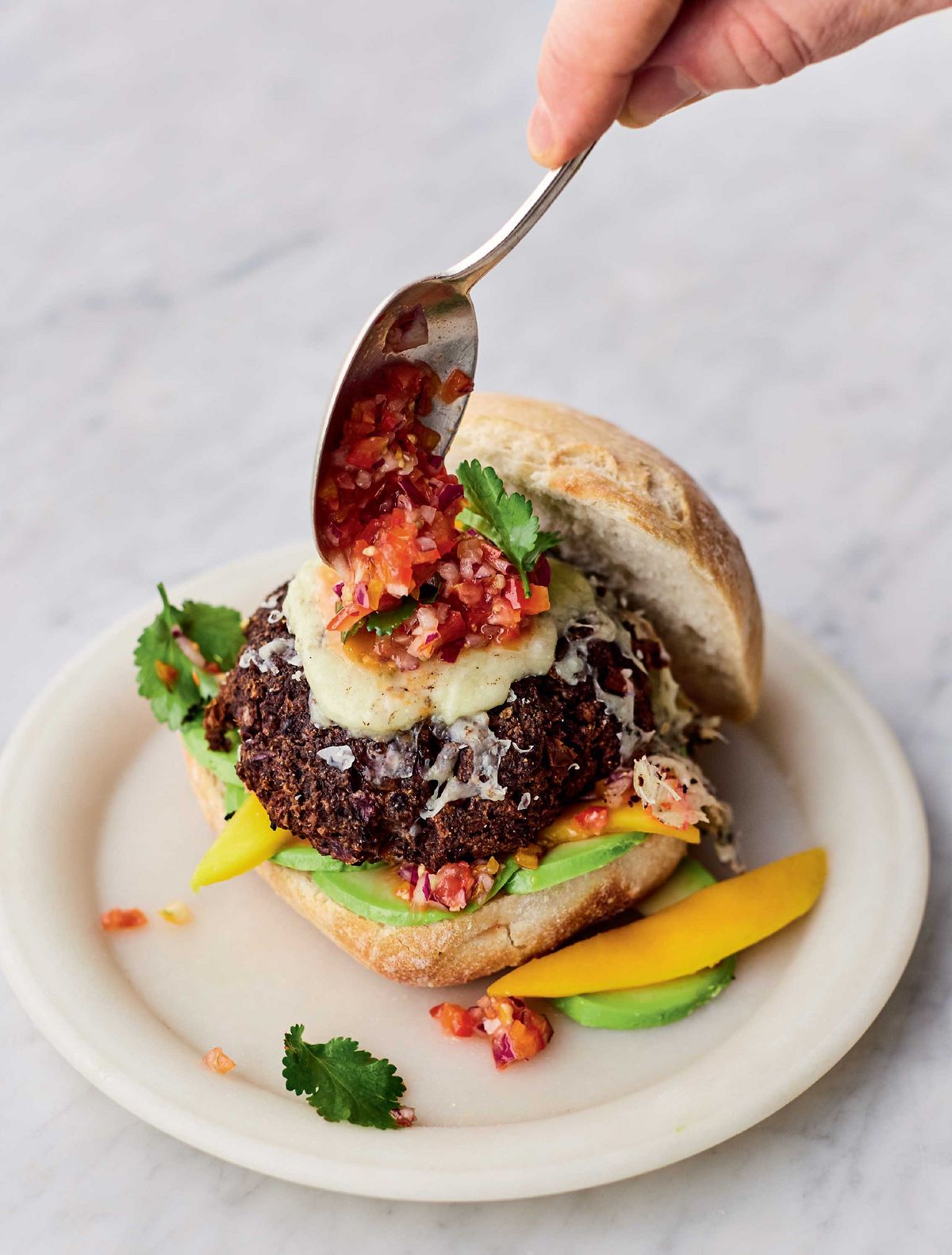 Jamie Oliver’s Roasted Black Bean Burgers with Zingy Salsa, Yoghurt, Sliced Mango and Avocado