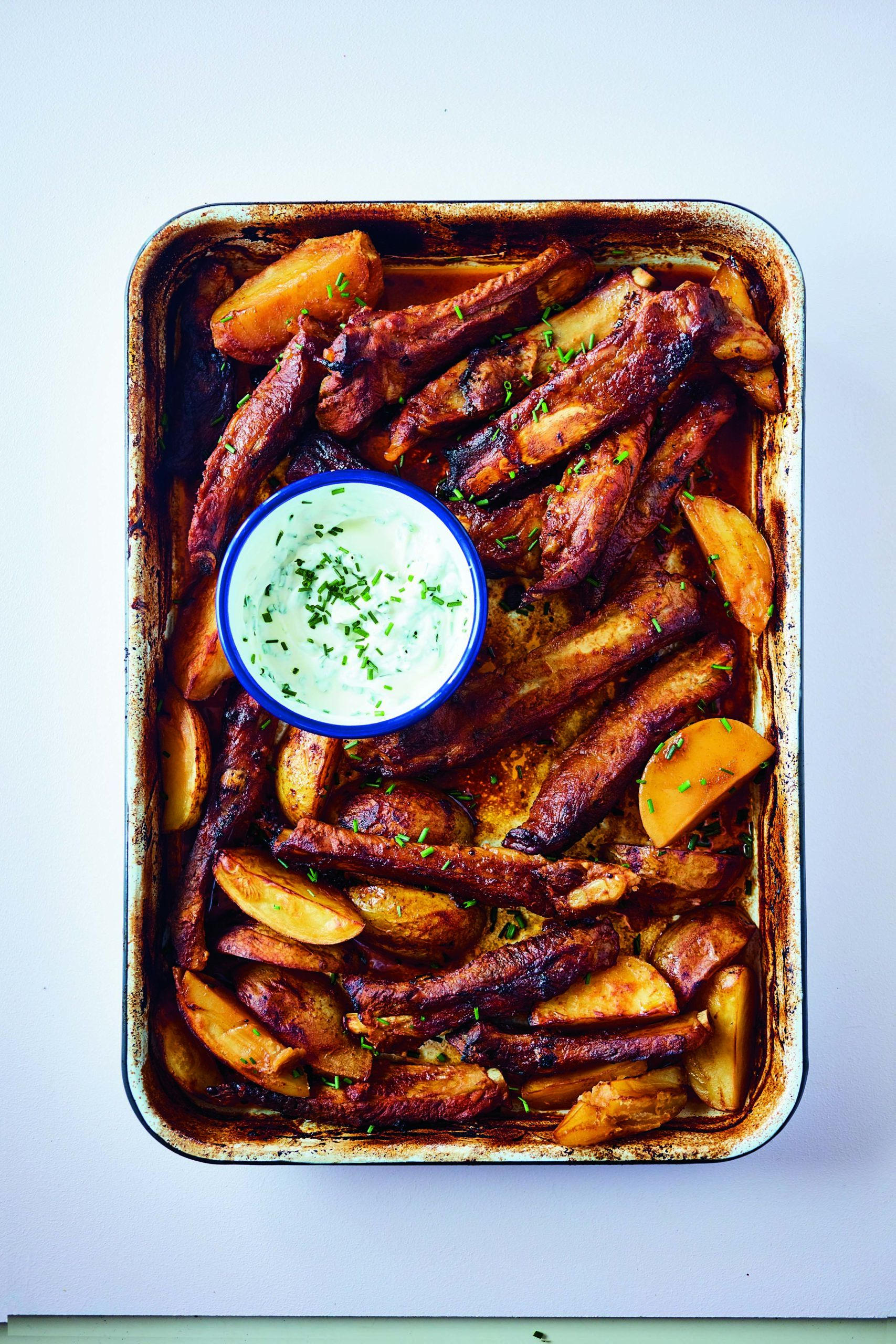 Rukmini Iyer’s Barbecue-Style Ribs with New Potatoes, Sour Cream and Chives