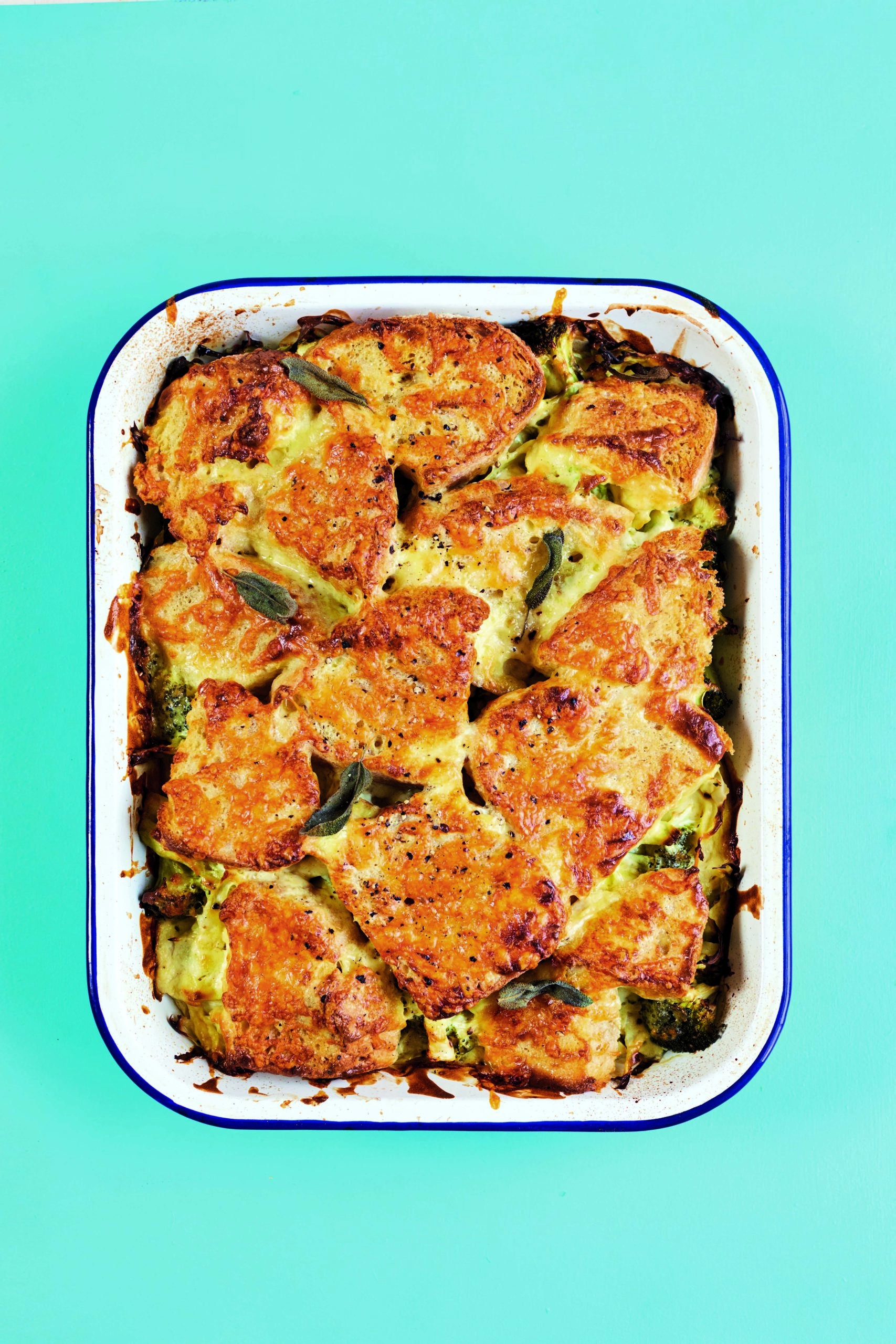 Crisp Cheddar-Topped Bread Cobbler With Chilli Spiked Greens