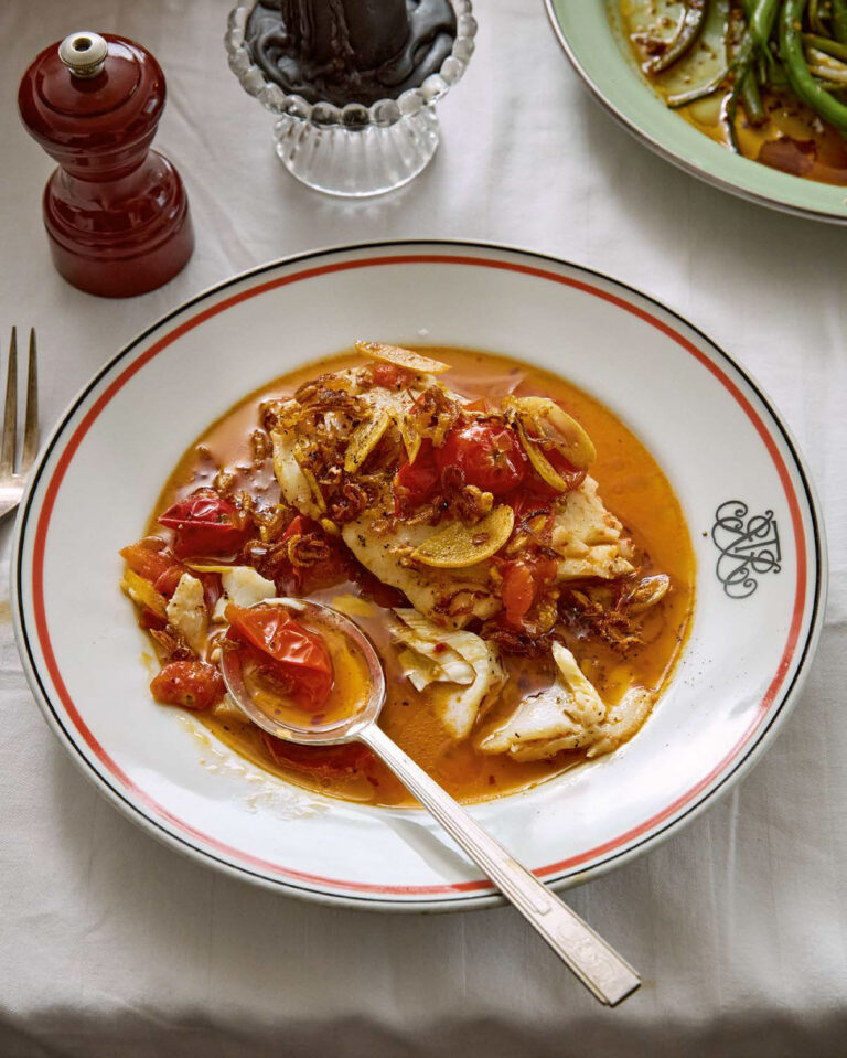 Alison Roman tomato-poached fish with crispy chilli oil