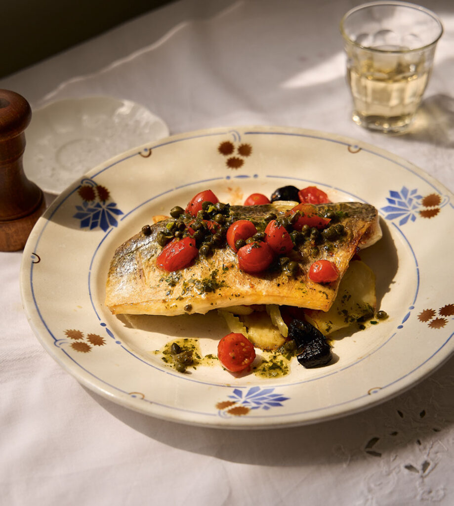 Baked Sea Bream Fillets on Potatoes with Fennel, Tomatoes and Olives