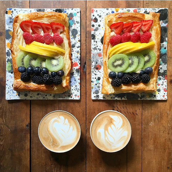 Blueberries, kiwi, mango and strawberries on a puff pastry slice 